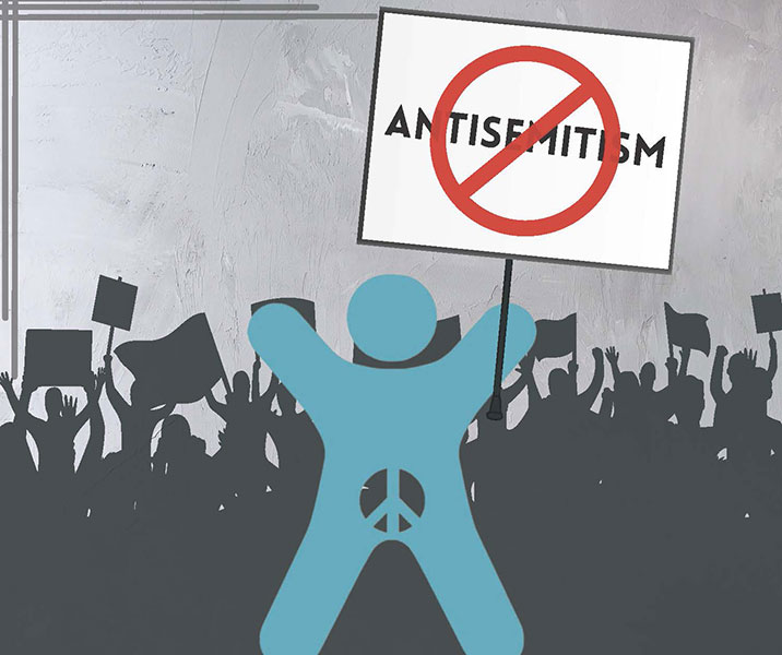 panneau contre antisemitisme tenu par militant pour autonomie genitale